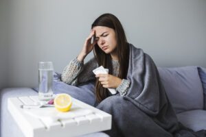 woman-couch-with-medication